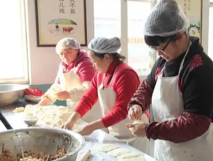 開包子鋪是用人工還是用機(jī)器